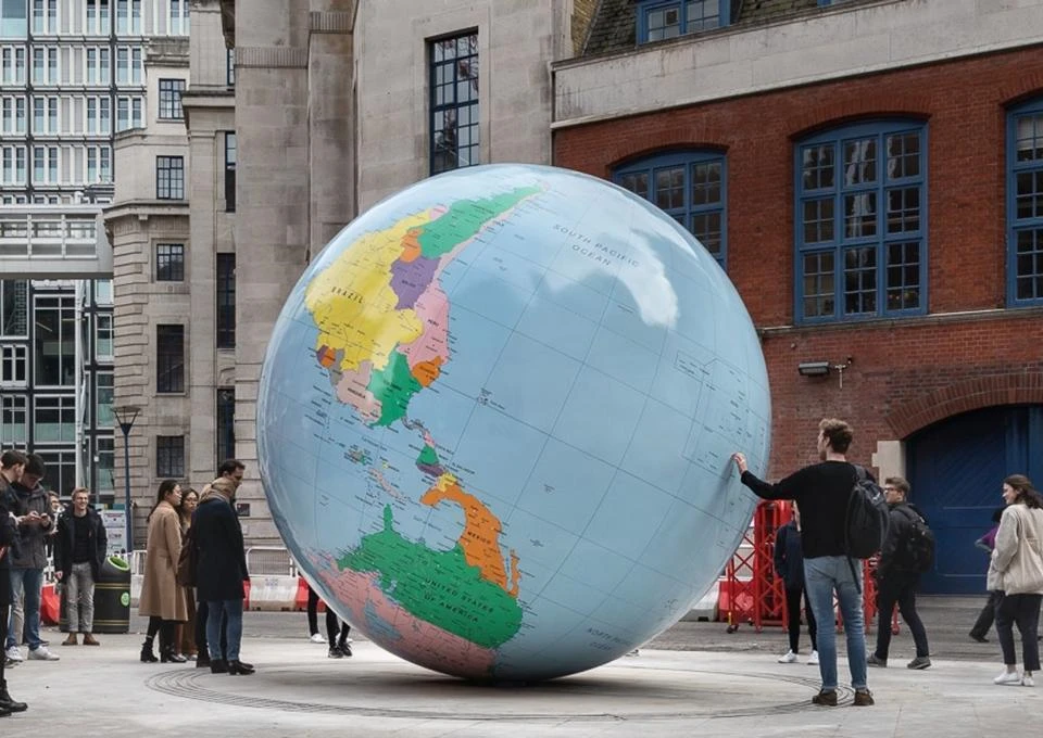 world turned upside down sculpture